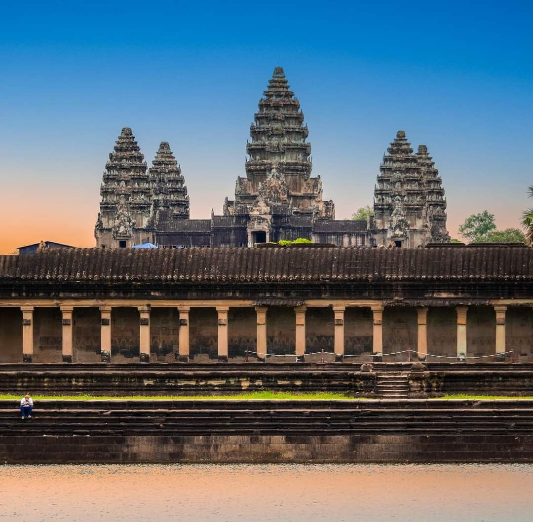 The towers and long stone galleries of Angkor Wat in Cambodia