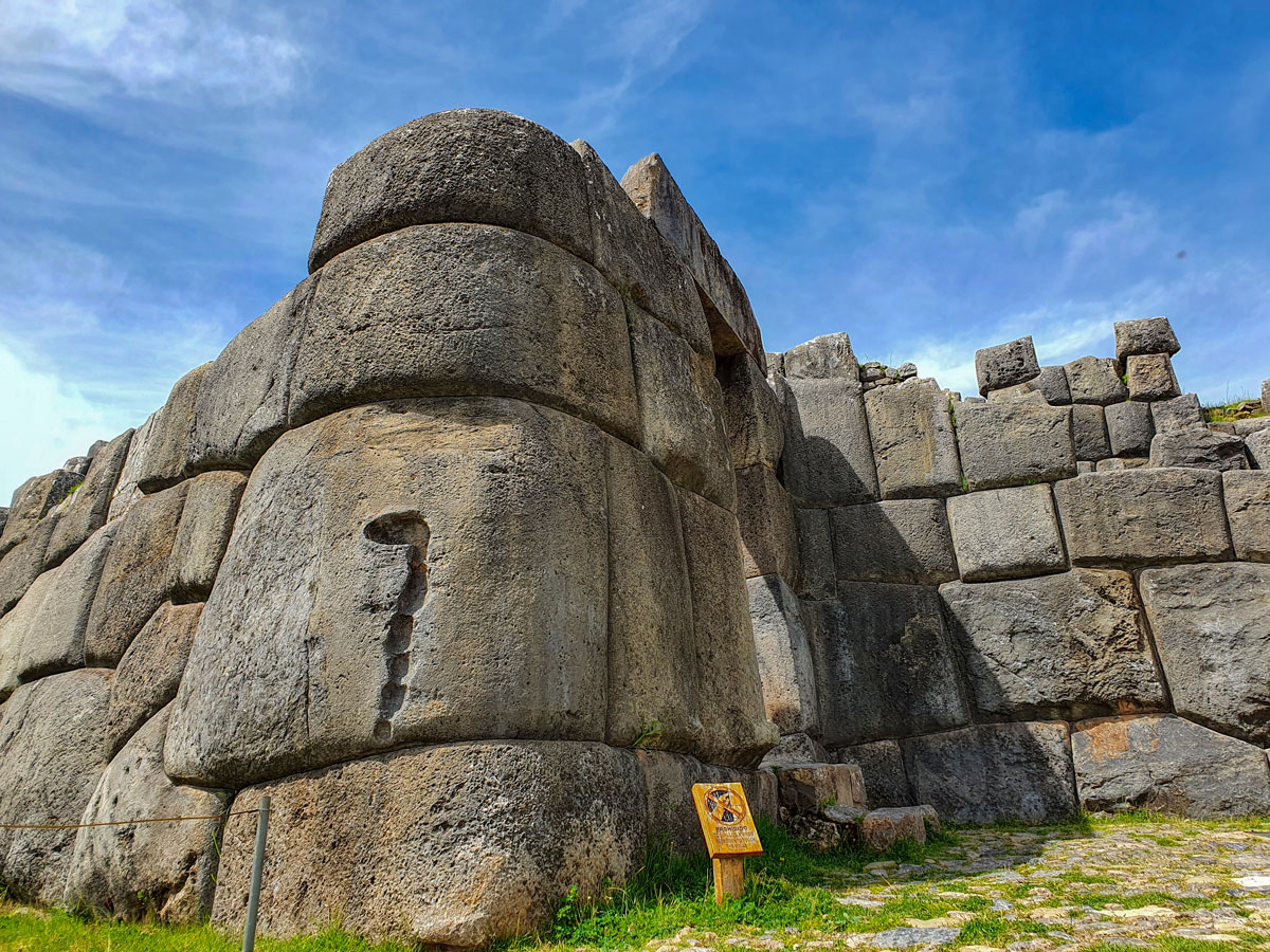 Massive irregular stones fitted tightly together in the walls of Sacsayhuaman near Cusco, Peru